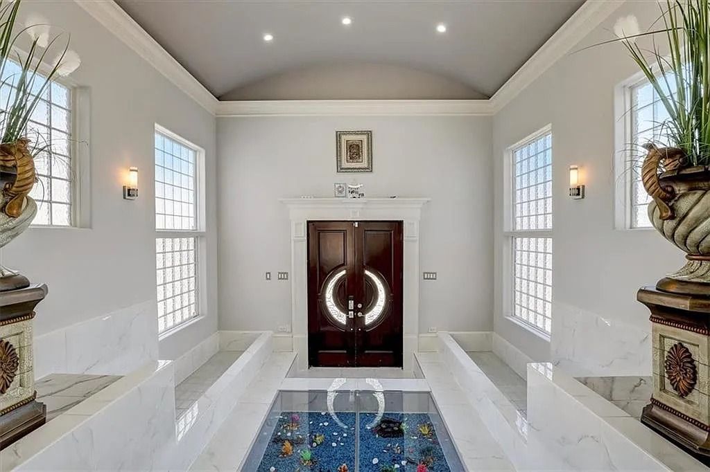 The Estate in Stone Mountain is a luxurious home where beautiful flow and natural light are awe-inspiring now available for sale. This home located at 3125 Juhan Rd, Stone Mountain, Georgia; offering 08 bedrooms and 09 bathrooms with 15,906 square feet of living spaces. 