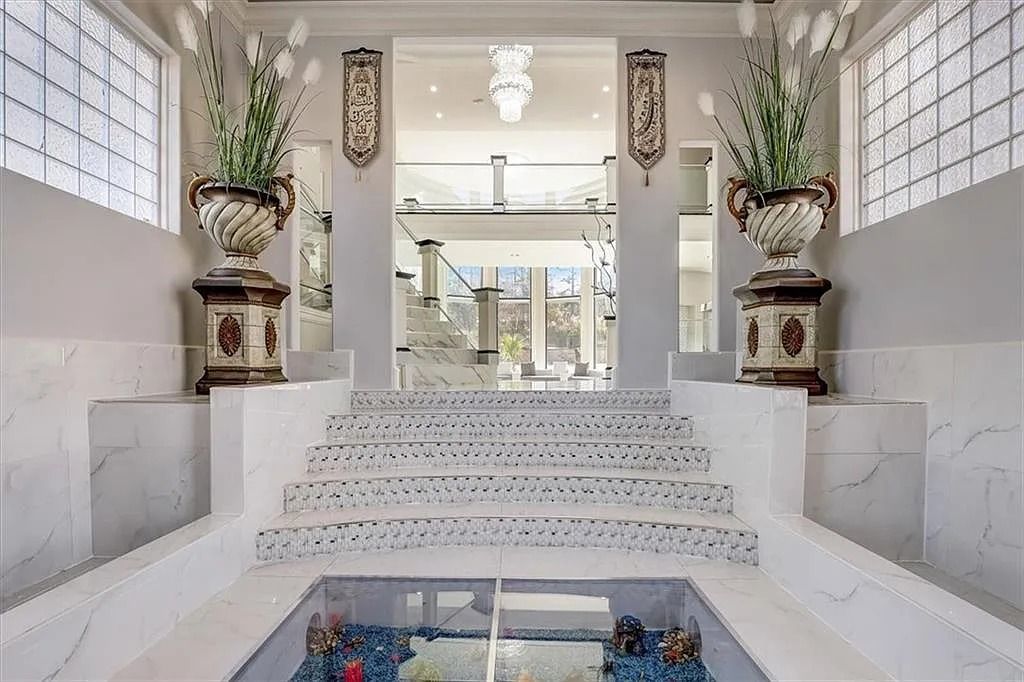 The Estate in Stone Mountain is a luxurious home where beautiful flow and natural light are awe-inspiring now available for sale. This home located at 3125 Juhan Rd, Stone Mountain, Georgia; offering 08 bedrooms and 09 bathrooms with 15,906 square feet of living spaces. 