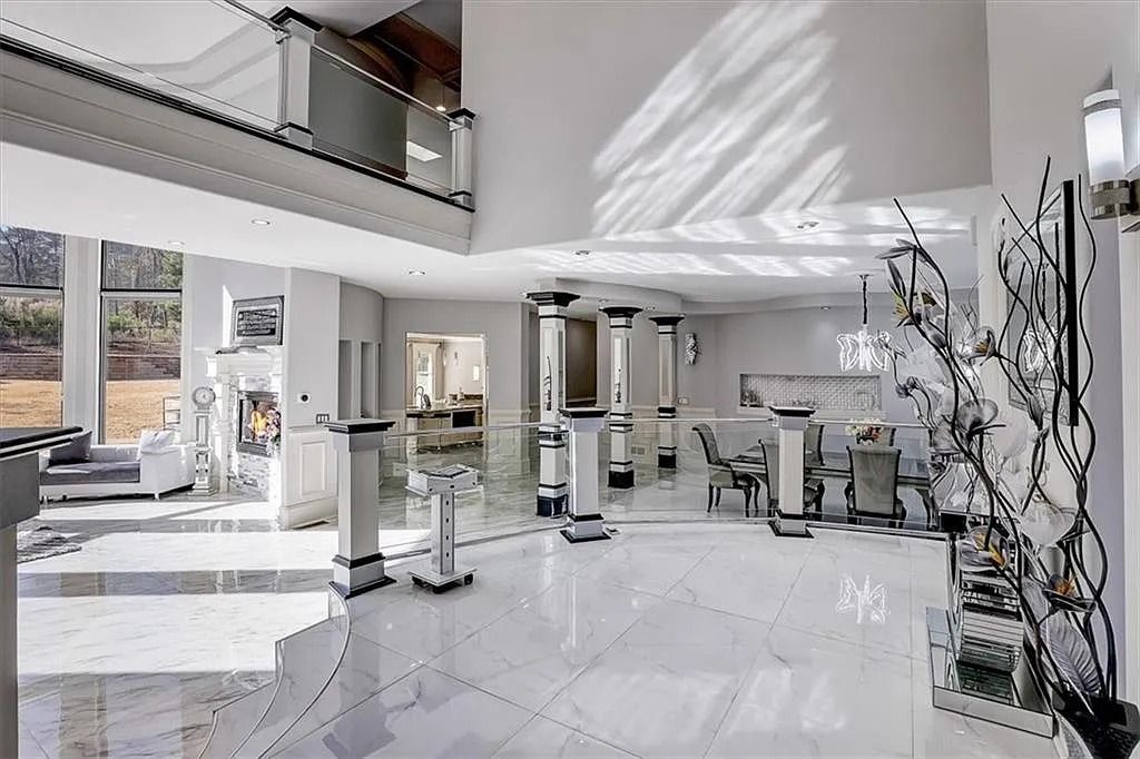 The Estate in Stone Mountain is a luxurious home where beautiful flow and natural light are awe-inspiring now available for sale. This home located at 3125 Juhan Rd, Stone Mountain, Georgia; offering 08 bedrooms and 09 bathrooms with 15,906 square feet of living spaces. 