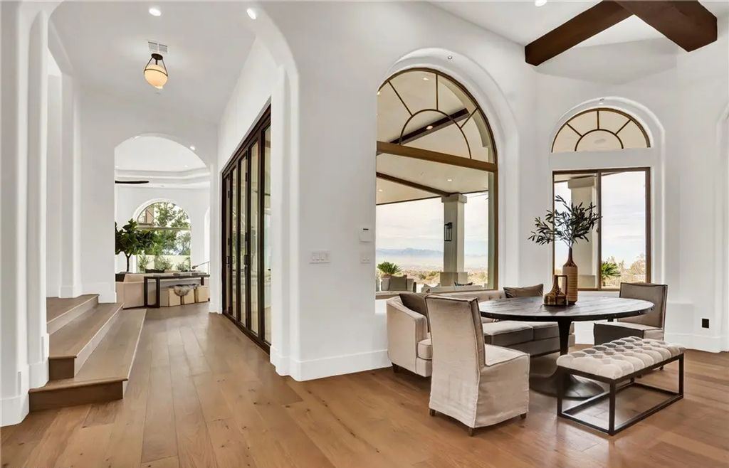 9 Yorkridge Court, Henderson, Nevada is a recently completed home perched high in the hills above the Green Fairways within the prestigious Anthem Country Club with the best unobstructed mountain, city and trip views. 