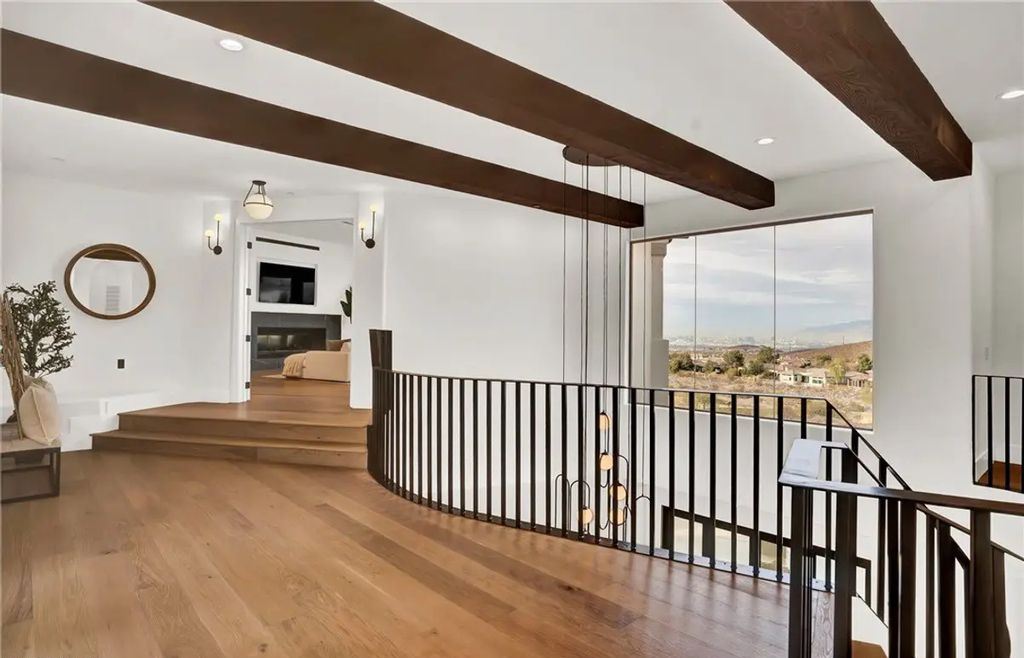 9 Yorkridge Court, Henderson, Nevada is a recently completed home perched high in the hills above the Green Fairways within the prestigious Anthem Country Club with the best unobstructed mountain, city and trip views. 
