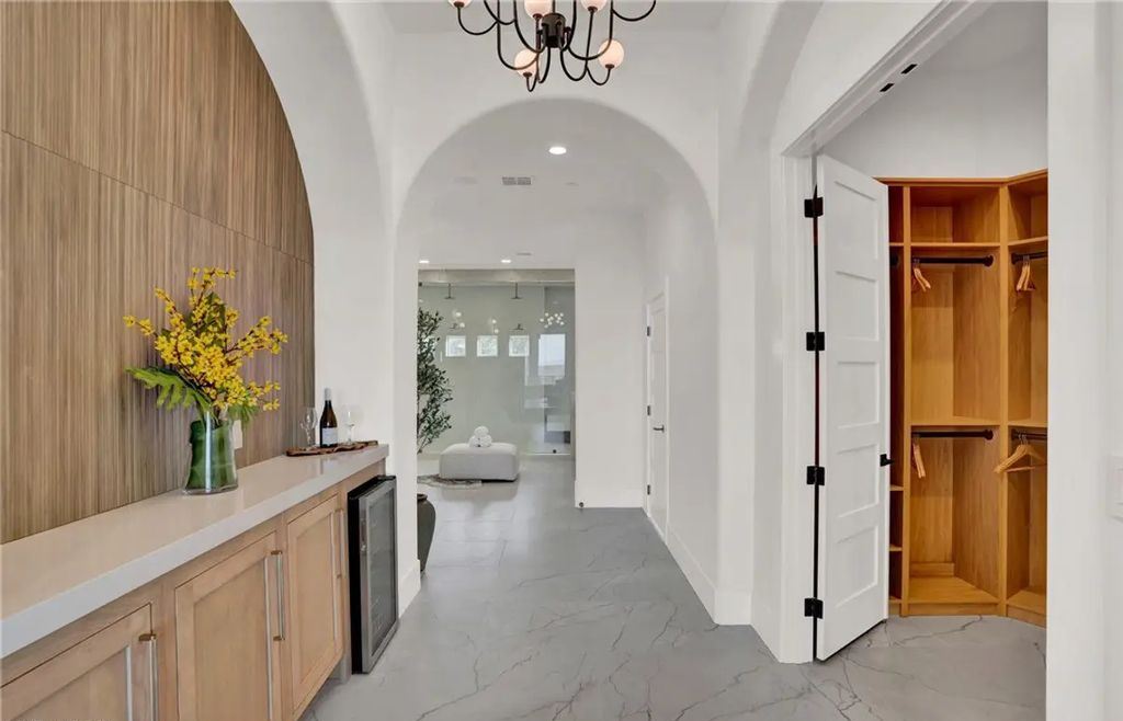 9 Yorkridge Court, Henderson, Nevada is a recently completed home perched high in the hills above the Green Fairways within the prestigious Anthem Country Club with the best unobstructed mountain, city and trip views. 