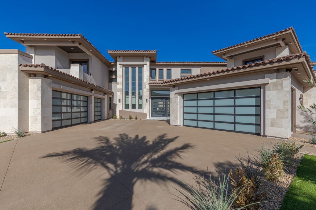 38 Ravenswood Avenue, Las Vegas, Nevada is a new custom home in the 24-hour guard-gated community of Southern Highlands Golf Club and breathtaking views of the nearby mountains.