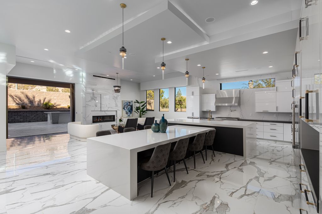 38 Ravenswood Avenue, Las Vegas, Nevada is a new custom home in the 24-hour guard-gated community of Southern Highlands Golf Club and breathtaking views of the nearby mountains.