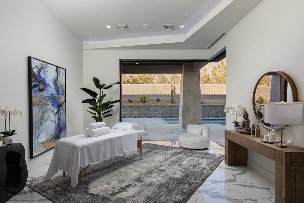 38 Ravenswood Avenue, Las Vegas, Nevada is a new custom home in the 24-hour guard-gated community of Southern Highlands Golf Club and breathtaking views of the nearby mountains.