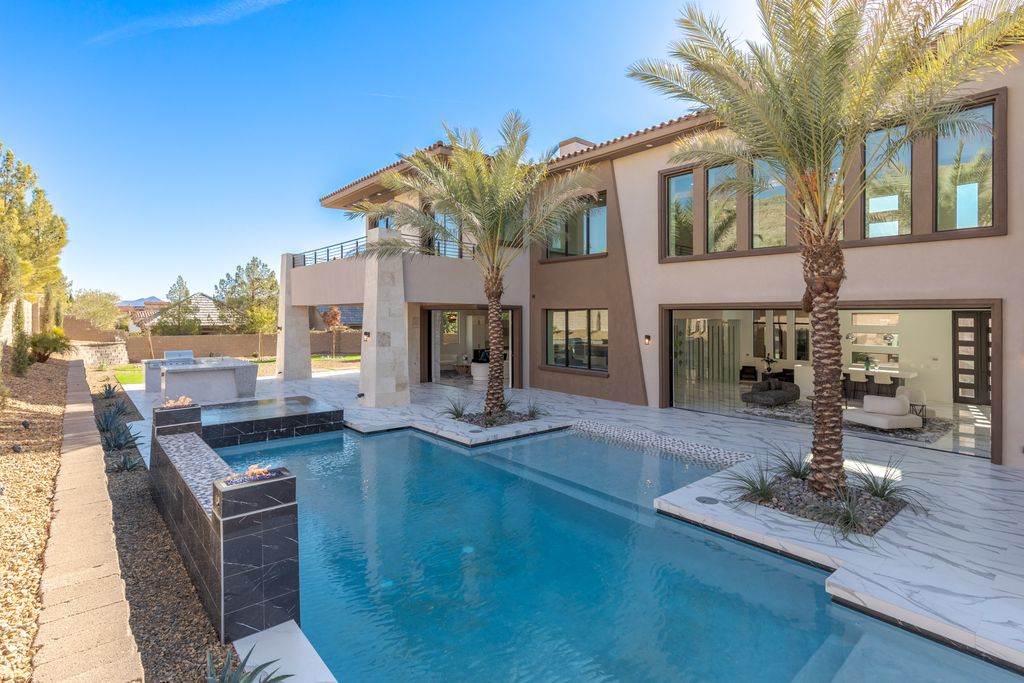 38 Ravenswood Avenue, Las Vegas, Nevada is a new custom home in the 24-hour guard-gated community of Southern Highlands Golf Club and breathtaking views of the nearby mountains.