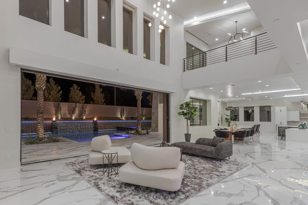 38 Ravenswood Avenue, Las Vegas, Nevada is a new custom home in the 24-hour guard-gated community of Southern Highlands Golf Club and breathtaking views of the nearby mountains.