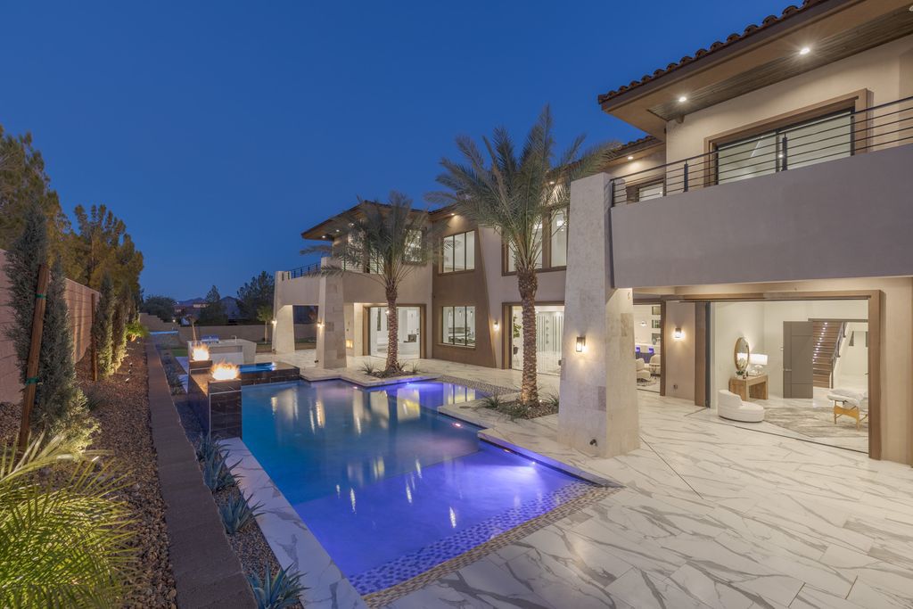 38 Ravenswood Avenue, Las Vegas, Nevada is a new custom home in the 24-hour guard-gated community of Southern Highlands Golf Club and breathtaking views of the nearby mountains.