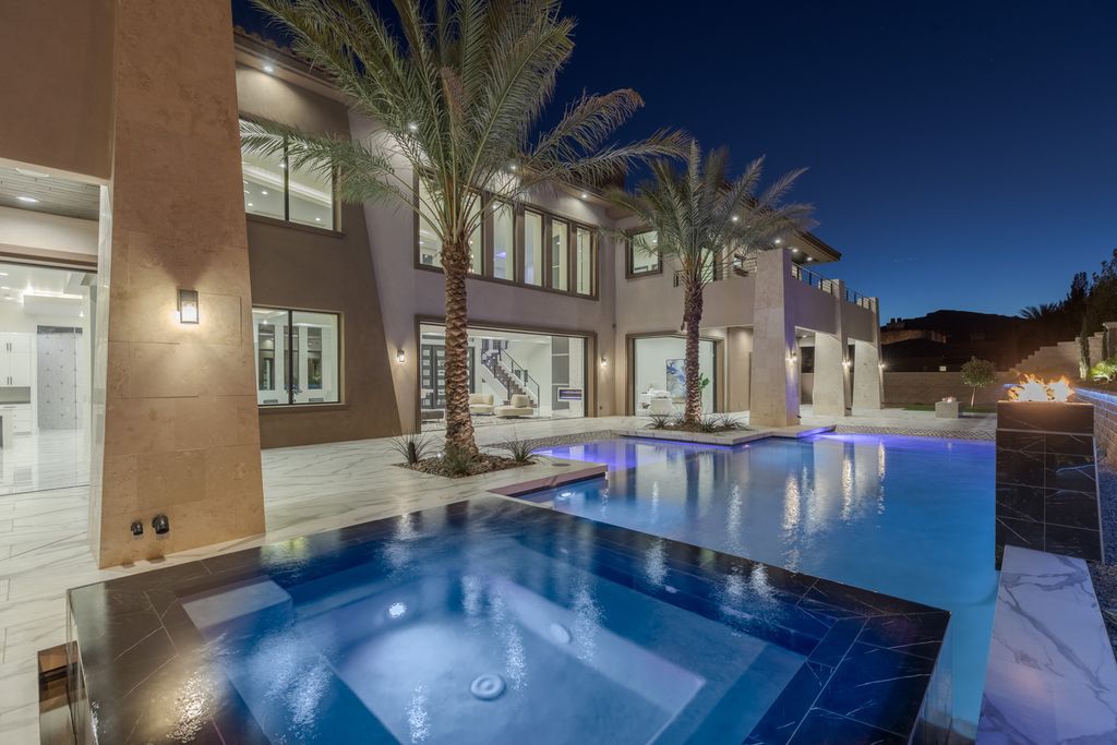 38 Ravenswood Avenue, Las Vegas, Nevada is a new custom home in the 24-hour guard-gated community of Southern Highlands Golf Club and breathtaking views of the nearby mountains.