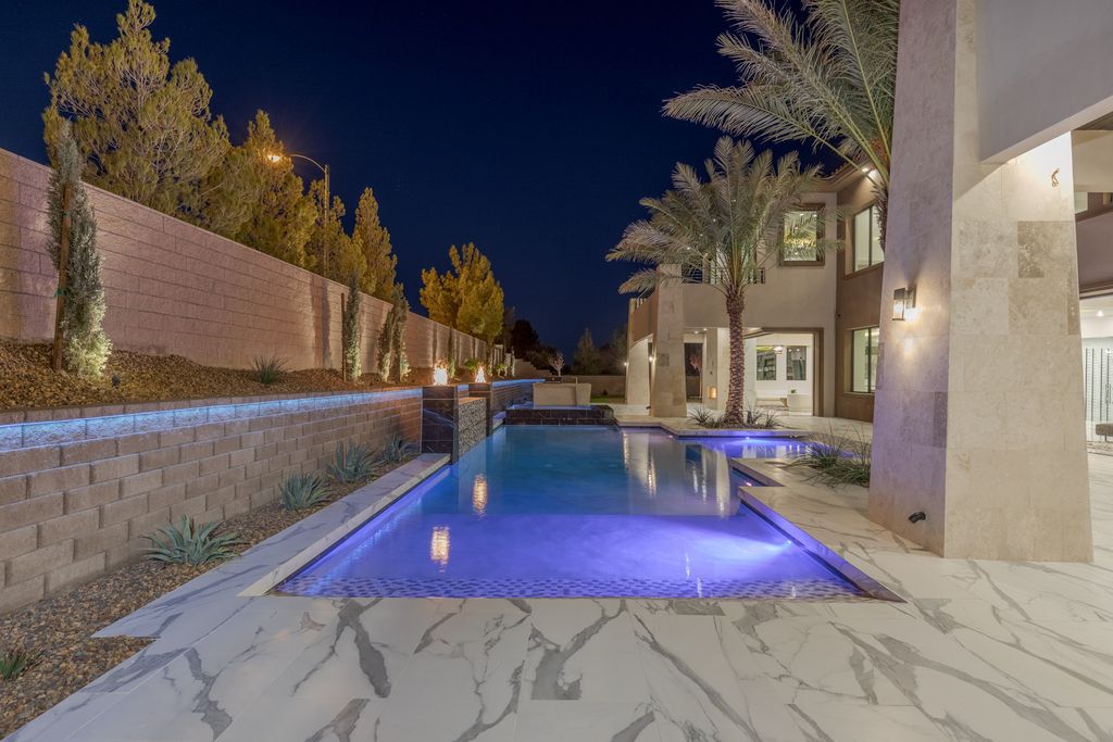 38 Ravenswood Avenue, Las Vegas, Nevada is a new custom home in the 24-hour guard-gated community of Southern Highlands Golf Club and breathtaking views of the nearby mountains.