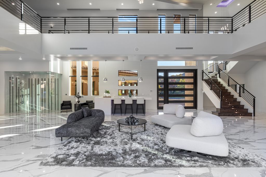 38 Ravenswood Avenue, Las Vegas, Nevada is a new custom home in the 24-hour guard-gated community of Southern Highlands Golf Club and breathtaking views of the nearby mountains.
