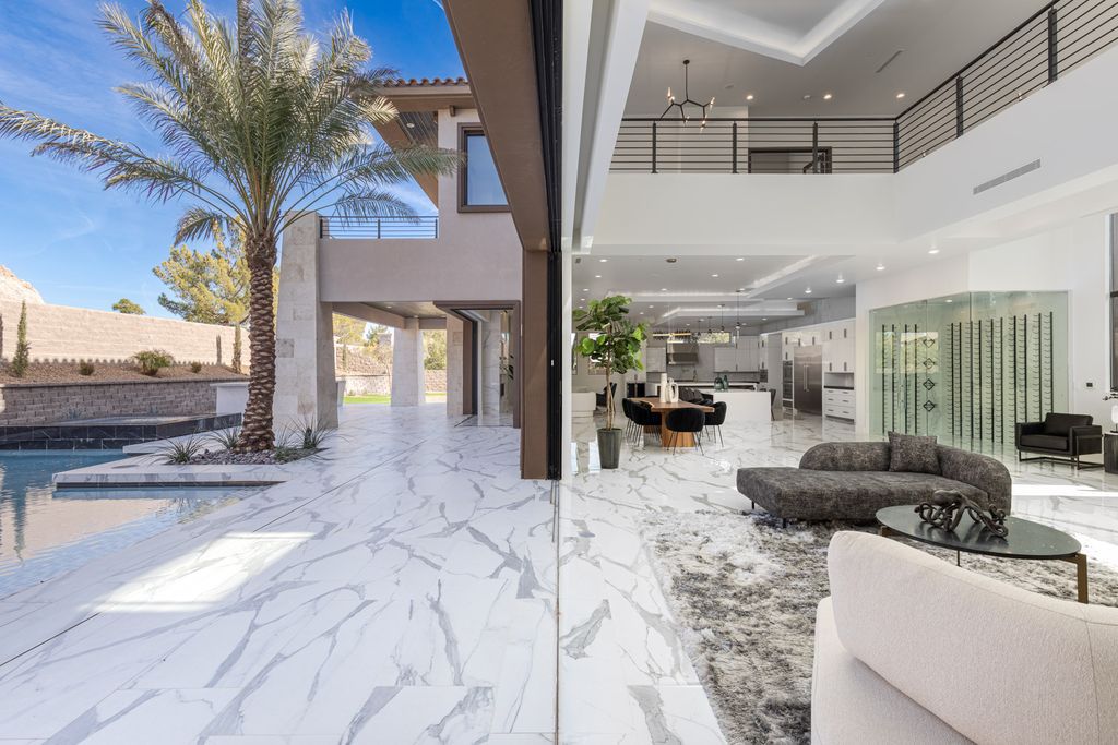 38 Ravenswood Avenue, Las Vegas, Nevada is a new custom home in the 24-hour guard-gated community of Southern Highlands Golf Club and breathtaking views of the nearby mountains.