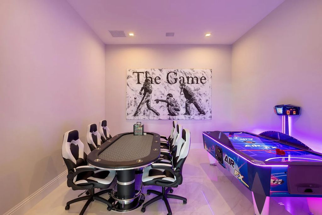 17055 Brulee Breeze Way, Boca Raton, Florida, is located in the heart of Boca Raton, Boca Bridges' centralized location, on an oversized 0.72 +- acre lot, which is the largest model offered at Boca Bridges. Integrating the sophisticated grandeur of resort-style living with family friendly amenities, this home offers a wide array of world-class amenities.
