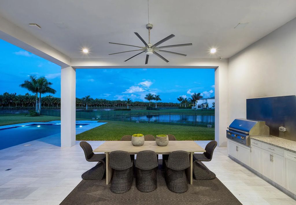 17055 Brulee Breeze Way, Boca Raton, Florida, is located in the heart of Boca Raton, Boca Bridges' centralized location, on an oversized 0.72 +- acre lot, which is the largest model offered at Boca Bridges. Integrating the sophisticated grandeur of resort-style living with family friendly amenities, this home offers a wide array of world-class amenities.