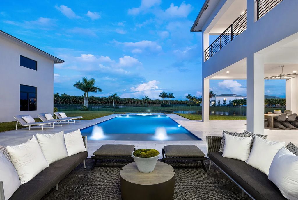 17055 Brulee Breeze Way, Boca Raton, Florida, is located in the heart of Boca Raton, Boca Bridges' centralized location, on an oversized 0.72 +- acre lot, which is the largest model offered at Boca Bridges. Integrating the sophisticated grandeur of resort-style living with family friendly amenities, this home offers a wide array of world-class amenities.