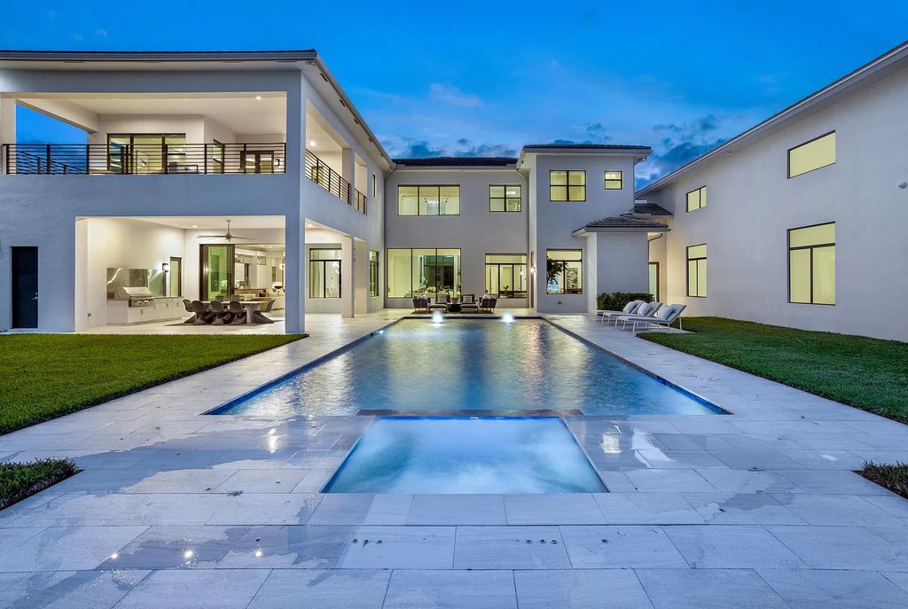 17055 Brulee Breeze Way, Boca Raton, Florida, is located in the heart of Boca Raton, Boca Bridges' centralized location, on an oversized 0.72 +- acre lot, which is the largest model offered at Boca Bridges. Integrating the sophisticated grandeur of resort-style living with family friendly amenities, this home offers a wide array of world-class amenities.