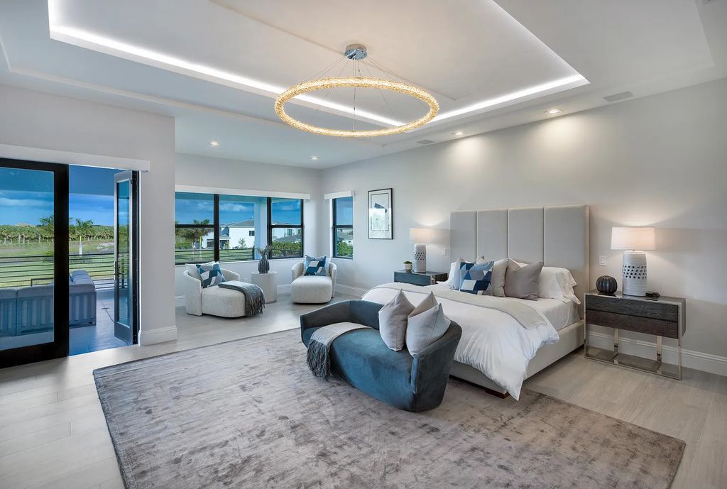 17055 Brulee Breeze Way, Boca Raton, Florida, is located in the heart of Boca Raton, Boca Bridges' centralized location, on an oversized 0.72 +- acre lot, which is the largest model offered at Boca Bridges. Integrating the sophisticated grandeur of resort-style living with family friendly amenities, this home offers a wide array of world-class amenities.