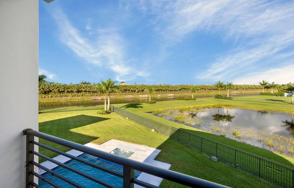17055 Brulee Breeze Way, Boca Raton, Florida, is located in the heart of Boca Raton, Boca Bridges' centralized location, on an oversized 0.72 +- acre lot, which is the largest model offered at Boca Bridges. Integrating the sophisticated grandeur of resort-style living with family friendly amenities, this home offers a wide array of world-class amenities.