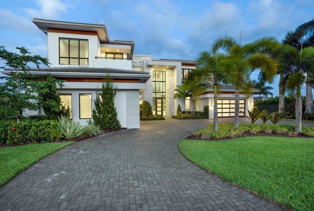 17055 Brulee Breeze Way, Boca Raton, Florida, is located in the heart of Boca Raton, Boca Bridges' centralized location, on an oversized 0.72 +- acre lot, which is the largest model offered at Boca Bridges. Integrating the sophisticated grandeur of resort-style living with family friendly amenities, this home offers a wide array of world-class amenities.