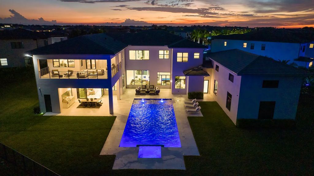 17055 Brulee Breeze Way, Boca Raton, Florida, is located in the heart of Boca Raton, Boca Bridges' centralized location, on an oversized 0.72 +- acre lot, which is the largest model offered at Boca Bridges. Integrating the sophisticated grandeur of resort-style living with family friendly amenities, this home offers a wide array of world-class amenities.