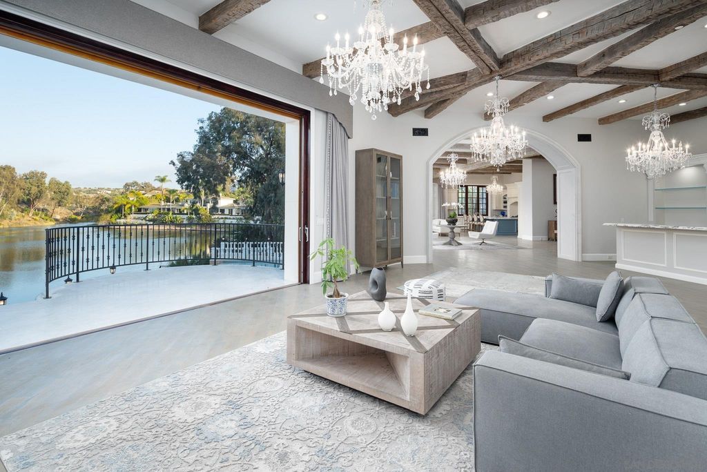 17176 Calle Serena, Rancho Santa Fe, California is a stunning custom European Villa on the lake in exclusive guard gated Fairbanks Ranch inspired by great architectural masterpieces around the world, built with a passion this timeless European home showcases exquisite imported materials.