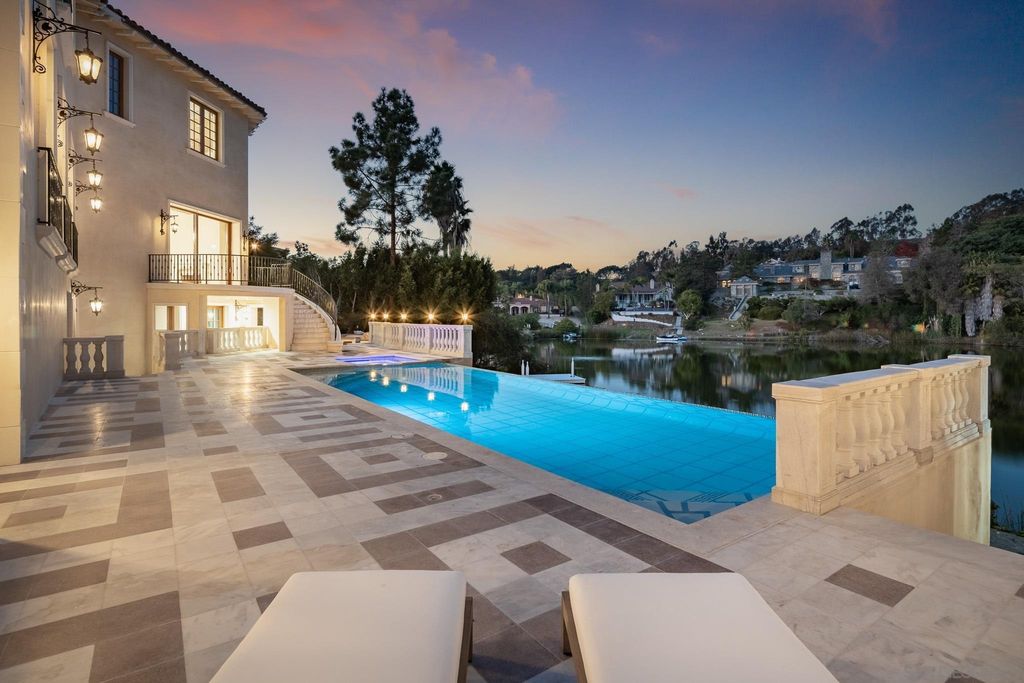 17176 Calle Serena, Rancho Santa Fe, California is a stunning custom European Villa on the lake in exclusive guard gated Fairbanks Ranch inspired by great architectural masterpieces around the world, built with a passion this timeless European home showcases exquisite imported materials.