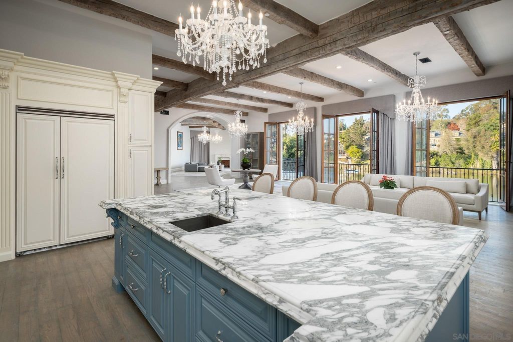 17176 Calle Serena, Rancho Santa Fe, California is a stunning custom European Villa on the lake in exclusive guard gated Fairbanks Ranch inspired by great architectural masterpieces around the world, built with a passion this timeless European home showcases exquisite imported materials.