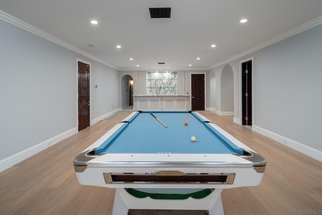 17176 Calle Serena, Rancho Santa Fe, California is a stunning custom European Villa on the lake in exclusive guard gated Fairbanks Ranch inspired by great architectural masterpieces around the world, built with a passion this timeless European home showcases exquisite imported materials.