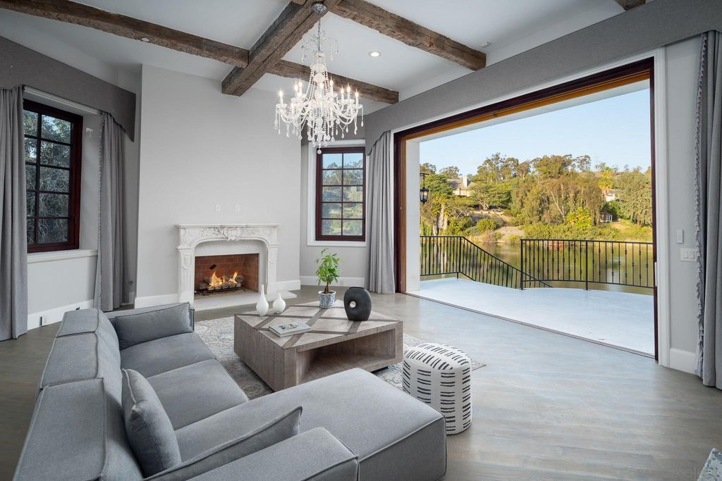 17176 Calle Serena, Rancho Santa Fe, California is a stunning custom European Villa on the lake in exclusive guard gated Fairbanks Ranch inspired by great architectural masterpieces around the world, built with a passion this timeless European home showcases exquisite imported materials.