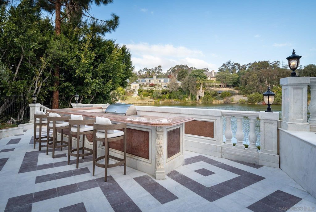 17176 Calle Serena, Rancho Santa Fe, California is a stunning custom European Villa on the lake in exclusive guard gated Fairbanks Ranch inspired by great architectural masterpieces around the world, built with a passion this timeless European home showcases exquisite imported materials.