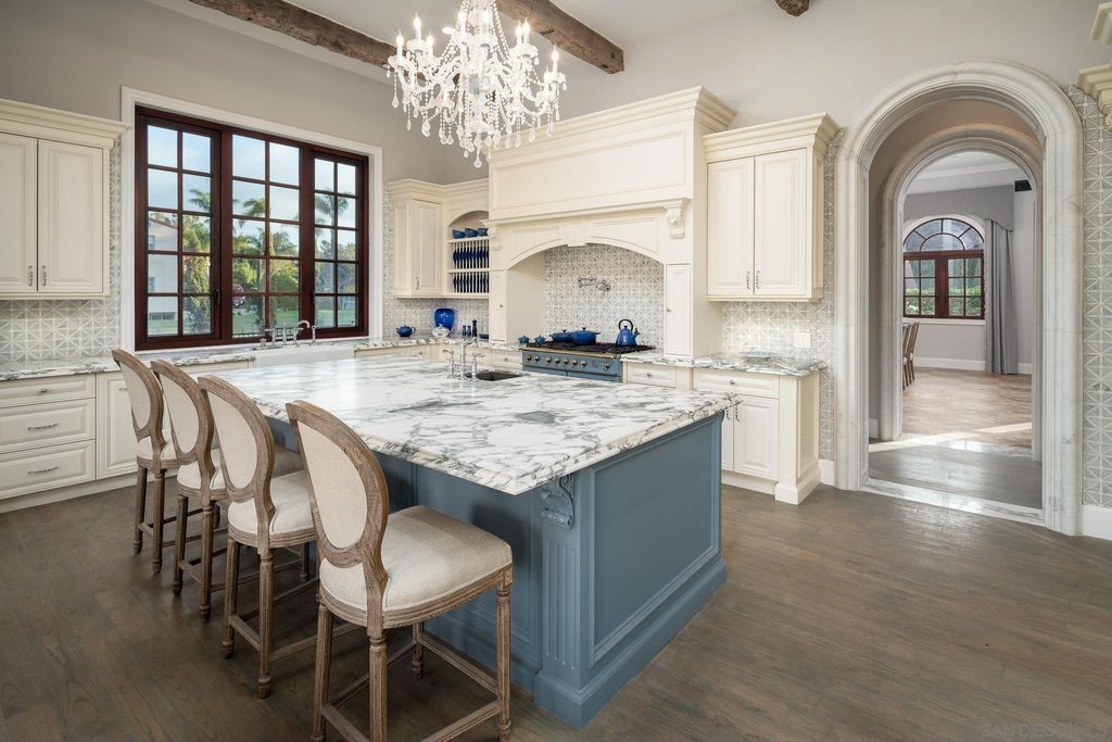 17176 Calle Serena, Rancho Santa Fe, California is a stunning custom European Villa on the lake in exclusive guard gated Fairbanks Ranch inspired by great architectural masterpieces around the world, built with a passion this timeless European home showcases exquisite imported materials.