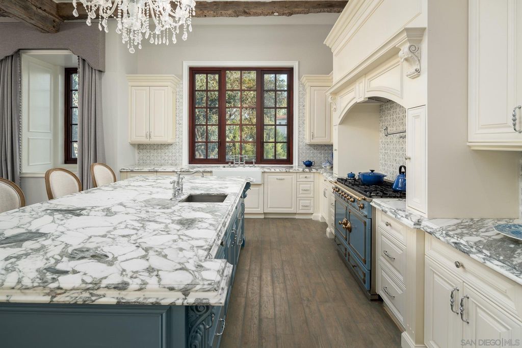 17176 Calle Serena, Rancho Santa Fe, California is a stunning custom European Villa on the lake in exclusive guard gated Fairbanks Ranch inspired by great architectural masterpieces around the world, built with a passion this timeless European home showcases exquisite imported materials.