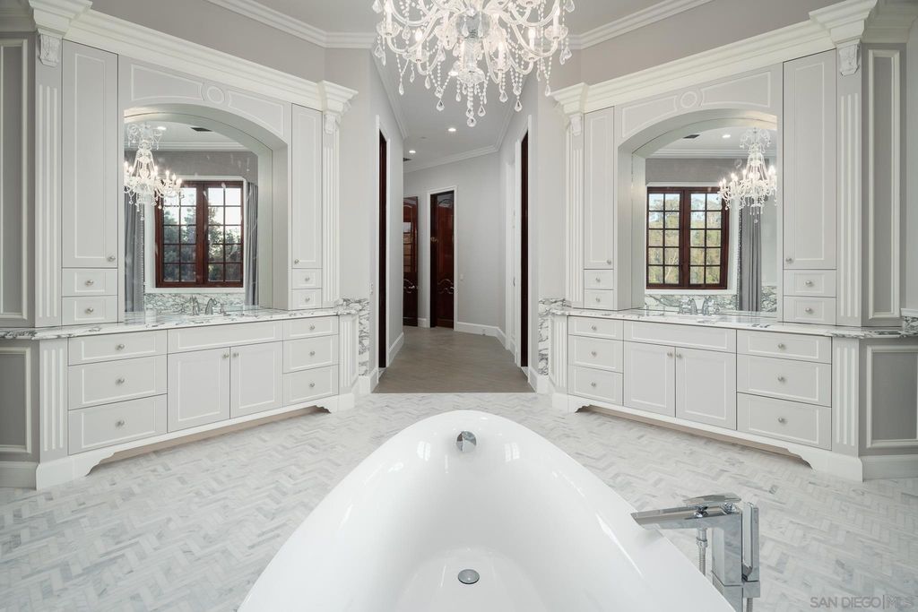 17176 Calle Serena, Rancho Santa Fe, California is a stunning custom European Villa on the lake in exclusive guard gated Fairbanks Ranch inspired by great architectural masterpieces around the world, built with a passion this timeless European home showcases exquisite imported materials.