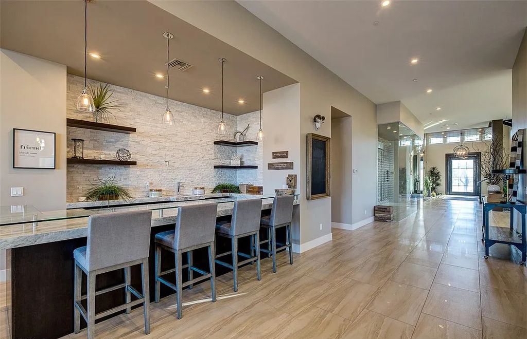 1376 Opal Valley Street, Henderson, Nevada is a retreat of all retreats located in Seven Hills on Rio Secco's 17th fairway featuring an amazing great room with true indoor/outdoor living, massive kitchen.