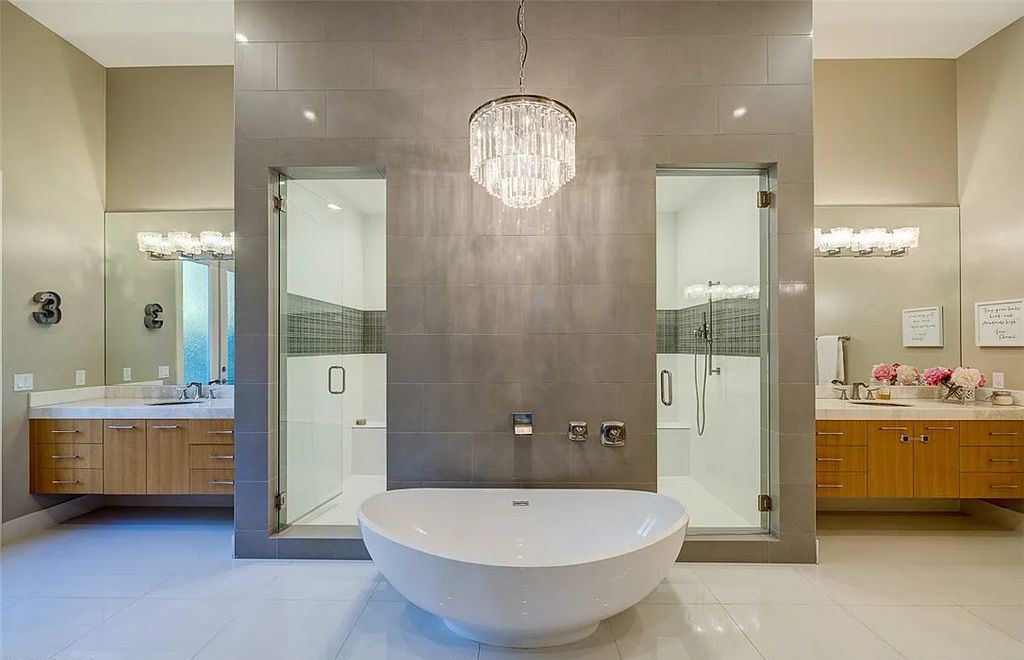 1376 Opal Valley Street, Henderson, Nevada is a retreat of all retreats located in Seven Hills on Rio Secco's 17th fairway featuring an amazing great room with true indoor/outdoor living, massive kitchen.