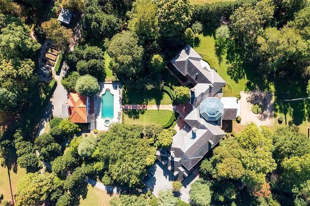 The Estate in Atlanta is a luxurious home designed for entertaining while providing developing options of the land investment in the future now available for sale. This home located at 825 Davis Dr, Atlanta, Georgia; offering 07 bedrooms and 11 bathrooms with 14,847 square feet of living spaces.