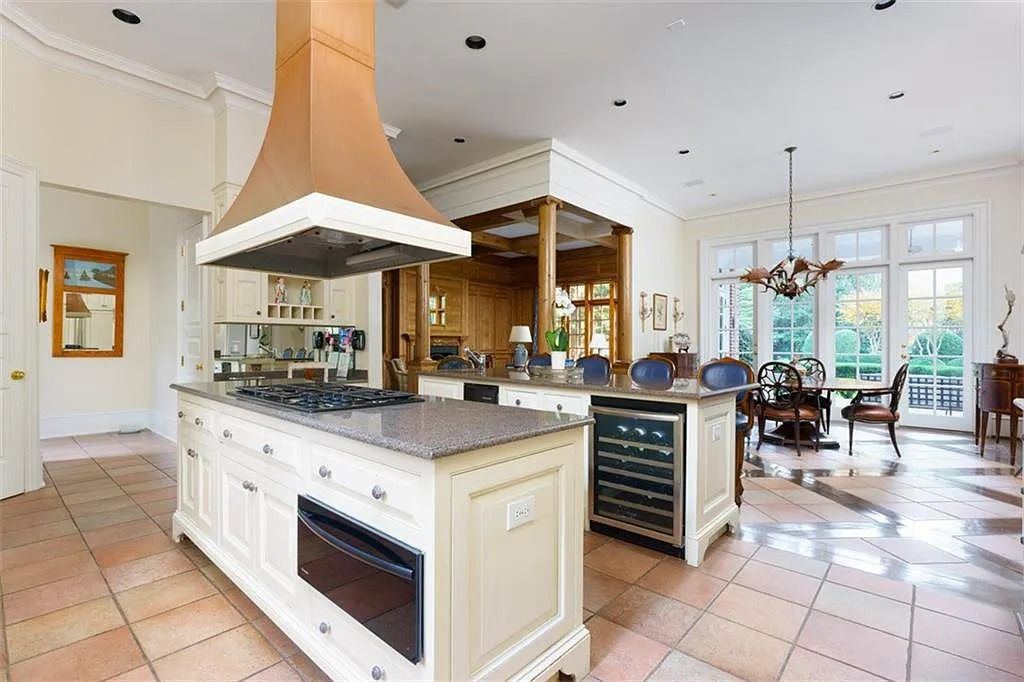 The Estate in Atlanta is a luxurious home designed for entertaining while providing developing options of the land investment in the future now available for sale. This home located at 825 Davis Dr, Atlanta, Georgia; offering 07 bedrooms and 11 bathrooms with 14,847 square feet of living spaces.