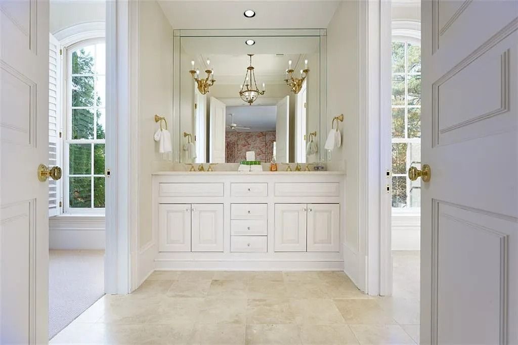 The Estate in Atlanta is a luxurious home designed for entertaining while providing developing options of the land investment in the future now available for sale. This home located at 825 Davis Dr, Atlanta, Georgia; offering 07 bedrooms and 11 bathrooms with 14,847 square feet of living spaces.