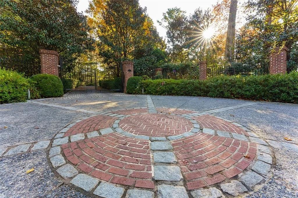 The Estate in Atlanta is a luxurious home designed for entertaining while providing developing options of the land investment in the future now available for sale. This home located at 825 Davis Dr, Atlanta, Georgia; offering 07 bedrooms and 11 bathrooms with 14,847 square feet of living spaces.