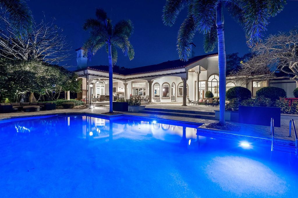 6030 Le Lac Road, Boca Raton, Florida, designed by award-winning architect Randall Stofft, is an exquisite lakefront estate located on 2.13 acres of meticulously manicured grounds within Boca Raton's most prestigious neighborhoods.