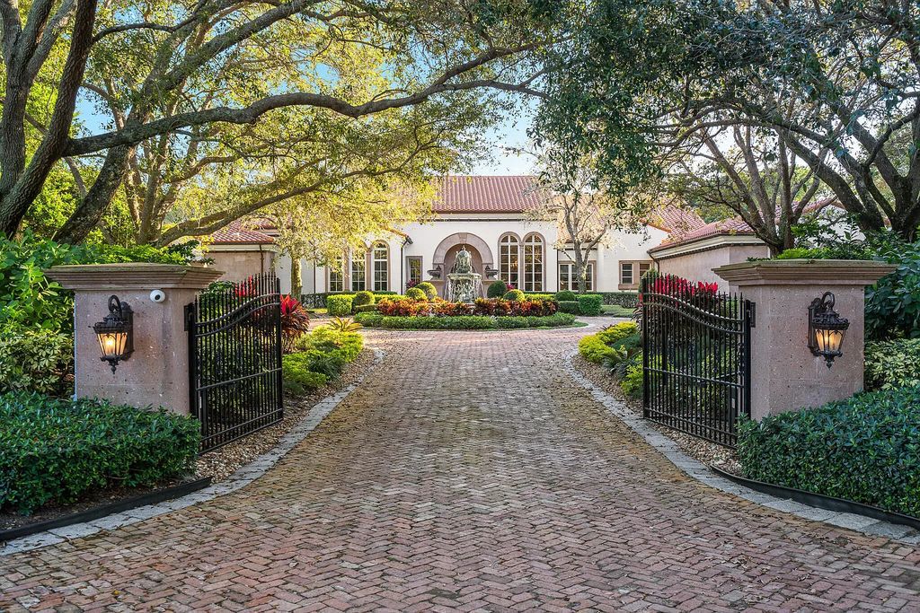 6030 Le Lac Road, Boca Raton, Florida, designed by award-winning architect Randall Stofft, is an exquisite lakefront estate located on 2.13 acres of meticulously manicured grounds within Boca Raton's most prestigious neighborhoods.