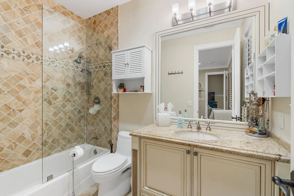6030 Le Lac Road, Boca Raton, Florida, designed by award-winning architect Randall Stofft, is an exquisite lakefront estate located on 2.13 acres of meticulously manicured grounds within Boca Raton's most prestigious neighborhoods.