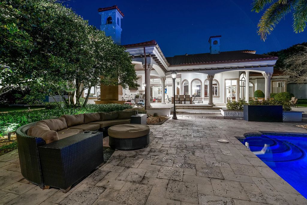 6030 Le Lac Road, Boca Raton, Florida, designed by award-winning architect Randall Stofft, is an exquisite lakefront estate located on 2.13 acres of meticulously manicured grounds within Boca Raton's most prestigious neighborhoods.