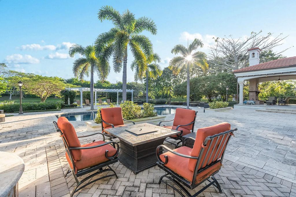6030 Le Lac Road, Boca Raton, Florida, designed by award-winning architect Randall Stofft, is an exquisite lakefront estate located on 2.13 acres of meticulously manicured grounds within Boca Raton's most prestigious neighborhoods.