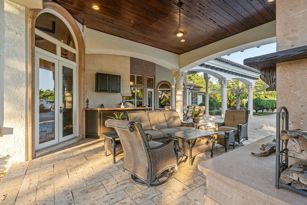 6030 Le Lac Road, Boca Raton, Florida, designed by award-winning architect Randall Stofft, is an exquisite lakefront estate located on 2.13 acres of meticulously manicured grounds within Boca Raton's most prestigious neighborhoods.