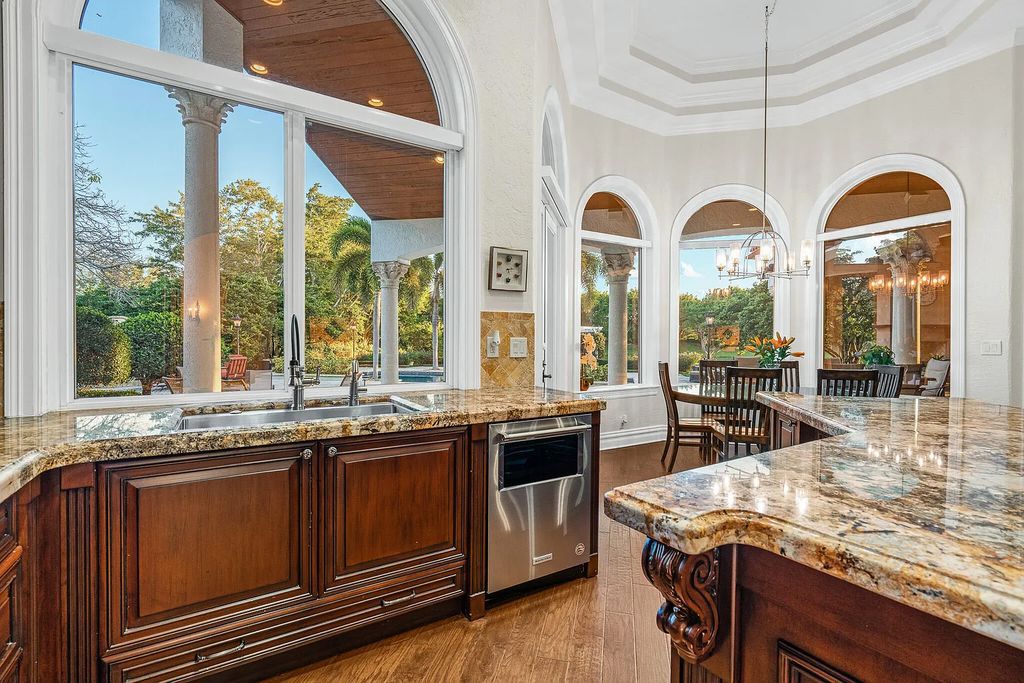 6030 Le Lac Road, Boca Raton, Florida, designed by award-winning architect Randall Stofft, is an exquisite lakefront estate located on 2.13 acres of meticulously manicured grounds within Boca Raton's most prestigious neighborhoods.