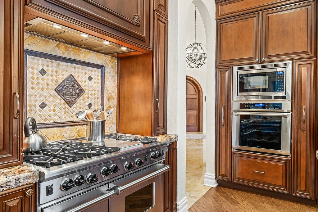 6030 Le Lac Road, Boca Raton, Florida, designed by award-winning architect Randall Stofft, is an exquisite lakefront estate located on 2.13 acres of meticulously manicured grounds within Boca Raton's most prestigious neighborhoods.