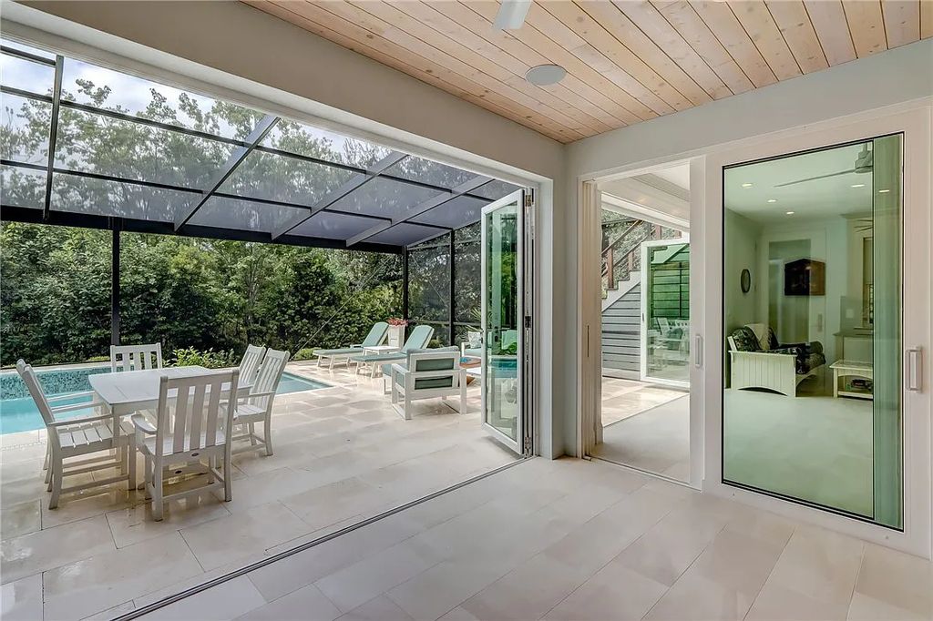 95343 Spinnaker Drive, Fernandina Beach, Florida is an impeccably maintained home was masterfully designed with a focus on outdoor living, restore & relax with amazing sunrises and sunsets from the second level screen porch.