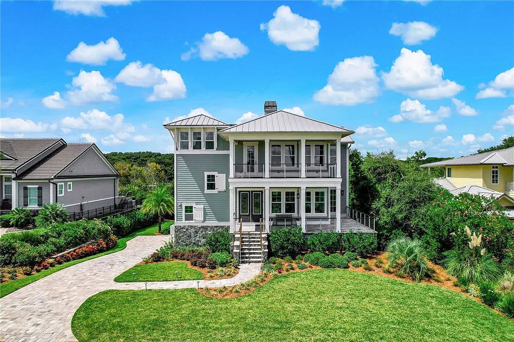 95343 Spinnaker Drive, Fernandina Beach, Florida is an impeccably maintained home was masterfully designed with a focus on outdoor living, restore & relax with amazing sunrises and sunsets from the second level screen porch.