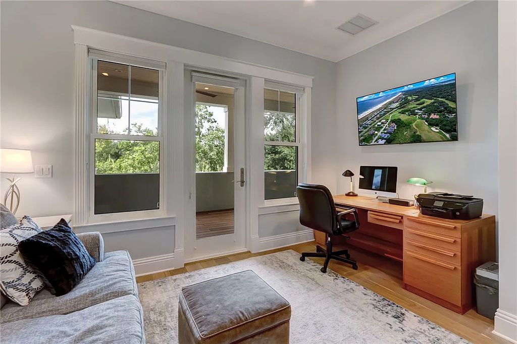 95343 Spinnaker Drive, Fernandina Beach, Florida is an impeccably maintained home was masterfully designed with a focus on outdoor living, restore & relax with amazing sunrises and sunsets from the second level screen porch.